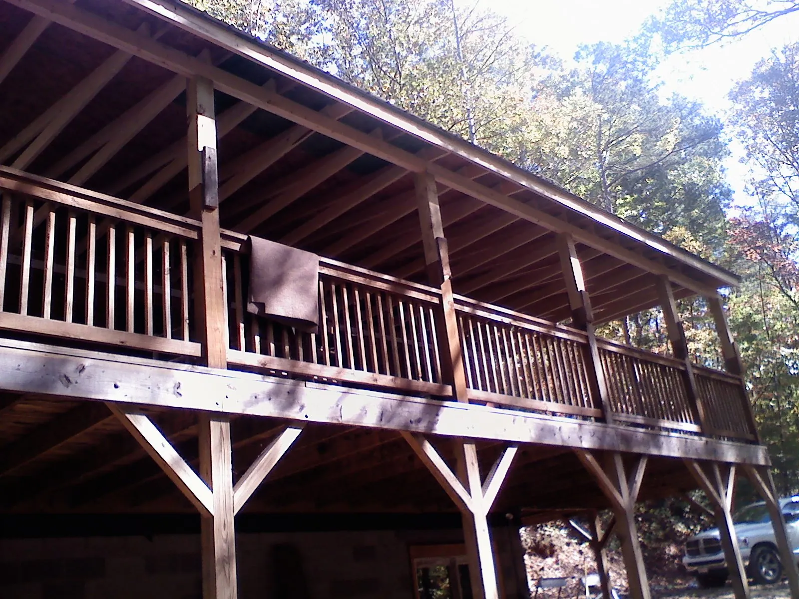 Timber framing under a new elevated porch and deck — Roof Leak Repair in Hacker Valley by Roofing Brothers